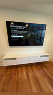 Hang television on wall