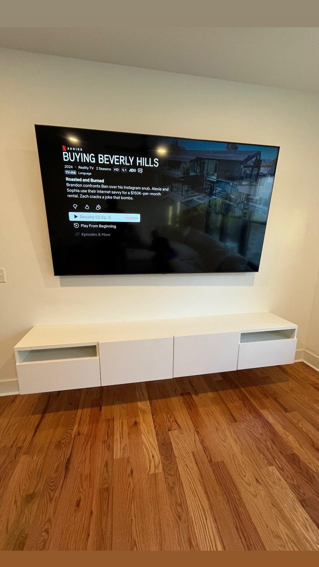 Hang television on wall